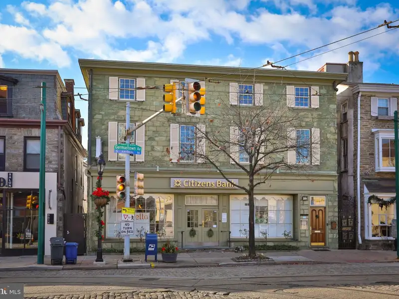 Historic Multi-use Building in Chestnut Hill Business District with Retail and Residential Units