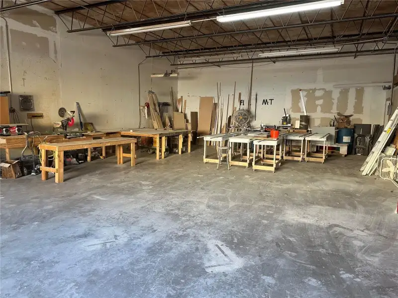 Industrial Property for Sale in Clearwater: Two Buildings with Office Space and Garage Access