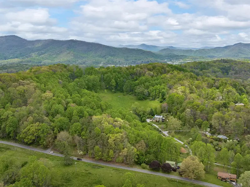 25+ Acre Pastoral Property with Pond and Mountain Views Near Downtown Waynesville