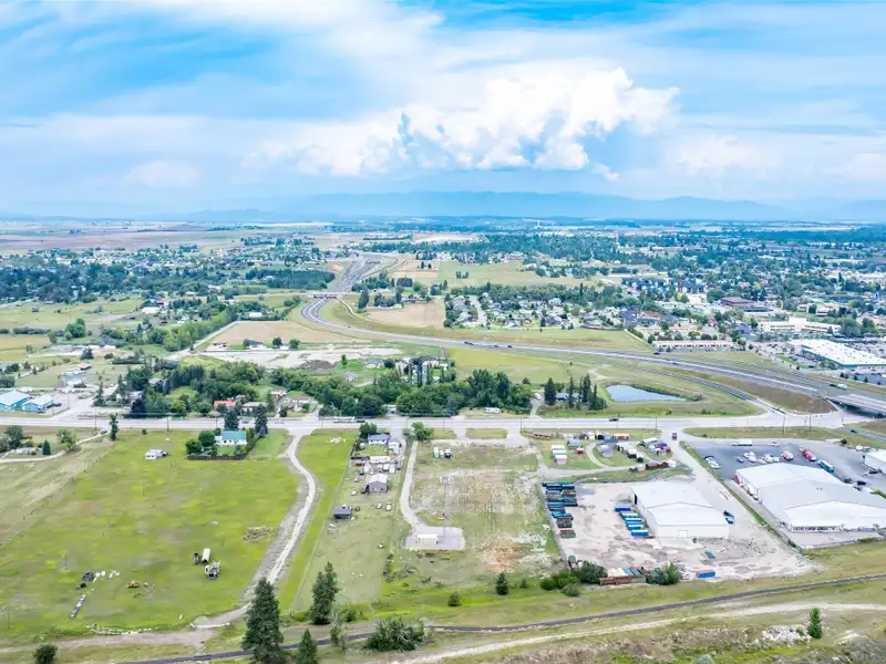 Flexible Development Site with Highway 2 Access and Income-generating Cell Tower