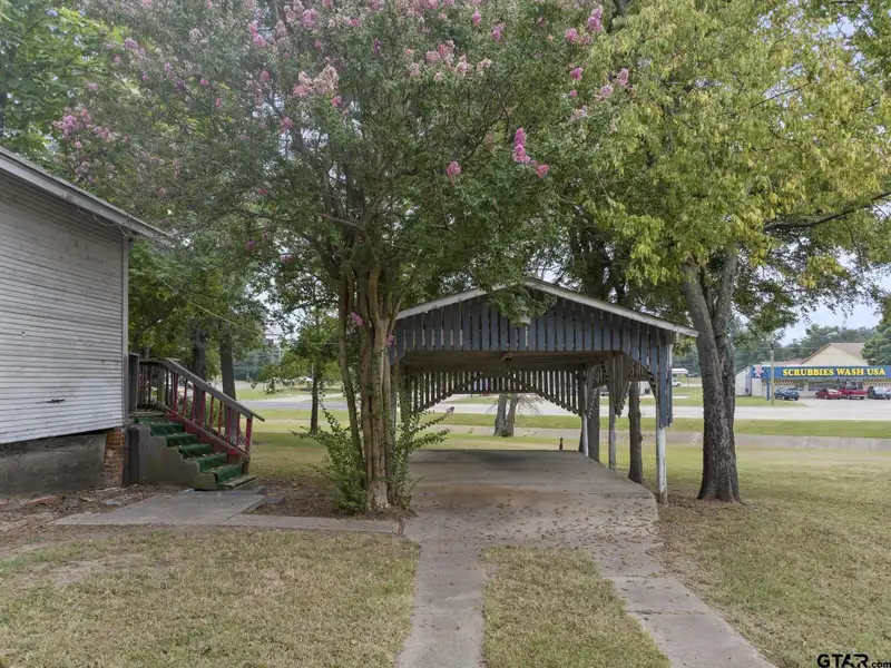 Prime Commercial Property with Building and Home on Half Acre Lot