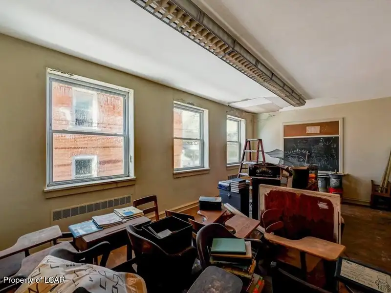 Versatile Downtown Hazleton Building: Former Worship Space with Offices/classrooms Potential