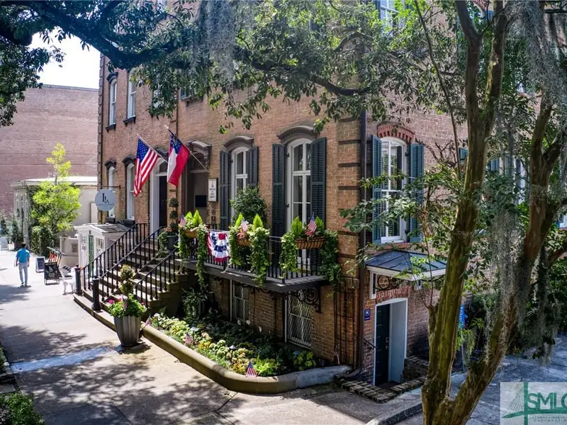 Restored 1871 Gray Brick Townhome in Savannah’s Historic District with Carriage House and Stvr Certificates