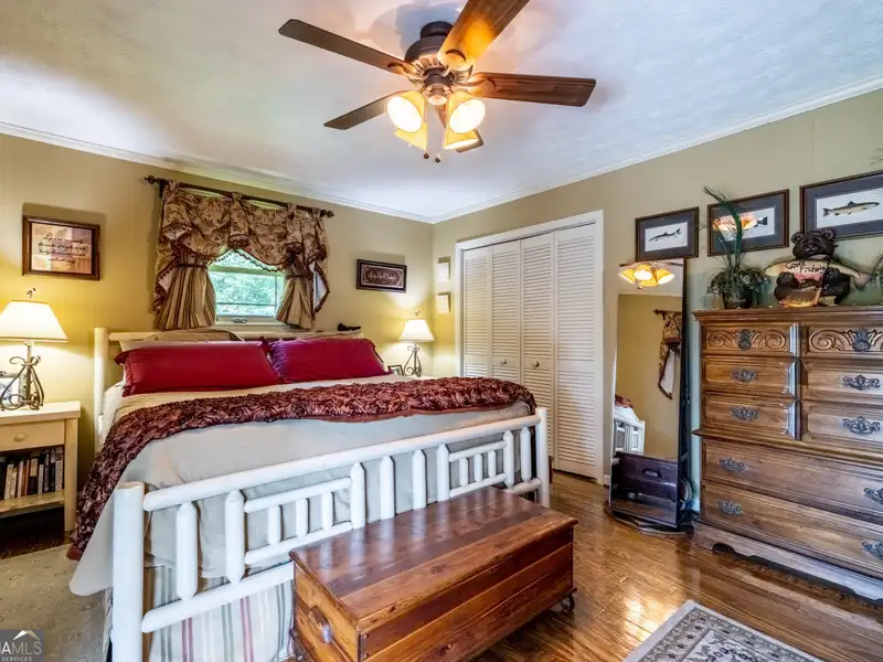 27 Acres with 2,400 Sq. Ft. Home, Duplexes, Pool, and Barn in Prime Location