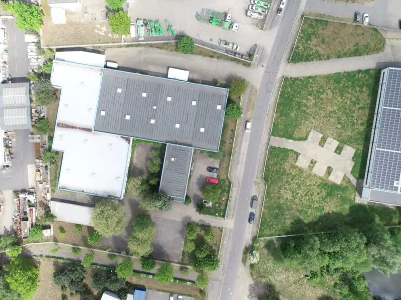 Versatile Commercial Property for Sale: 6,604 M² with Production Halls and Office Space