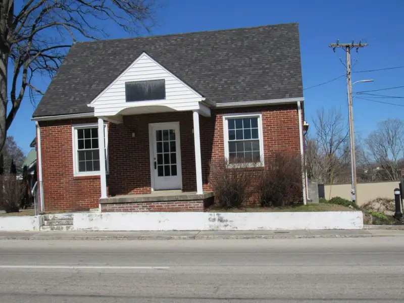 Commercial Investment Opportunity in Historic Mcminnville: Dual Buildings with High Visibility and Parking