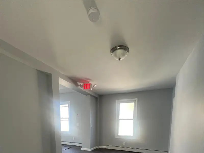 Mixed-use Building: 2nd Level Apartment & 1st Level Commercial Space in Prime Location