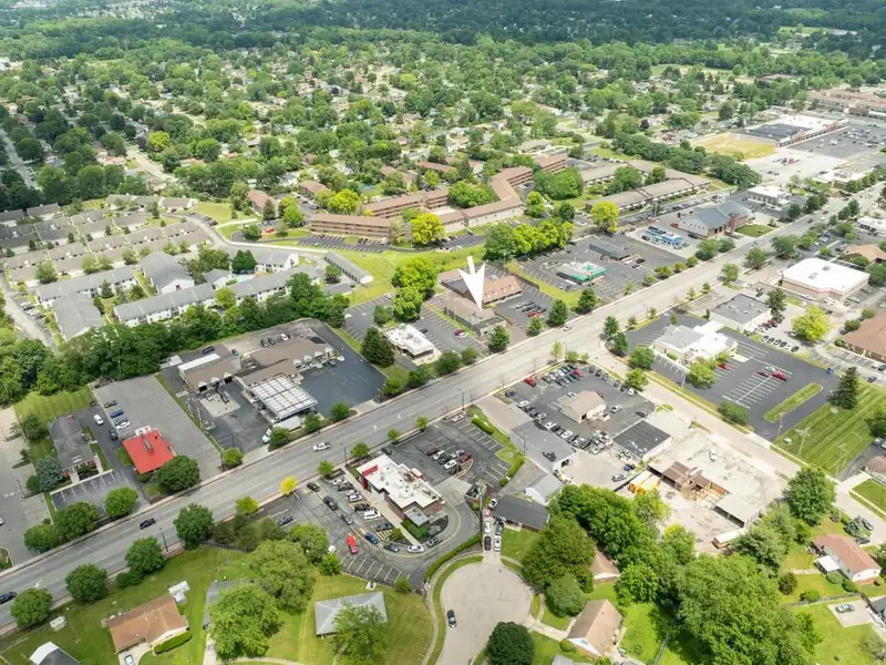 Prime Commercial Building in Downtown Reynoldsburg with Parking and Industrial Garage