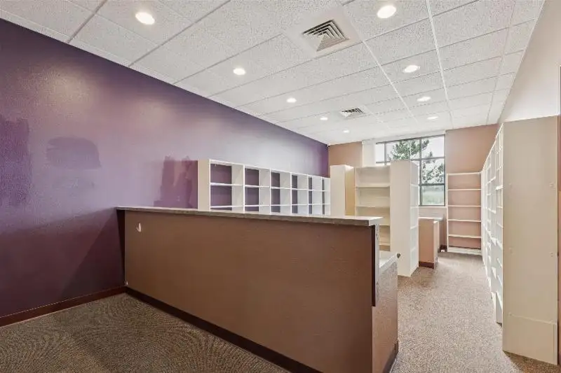 Versatile Commercial Condo for Sale Near Hwy 151 & 41 with Multiple Offices and Amenities