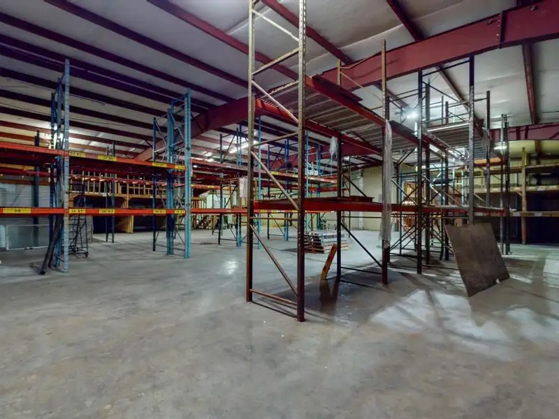 Commercial Property on Busy Highway - 2.1 Acres, 31,000 Sq Ft with Offices and Roll-up Doors