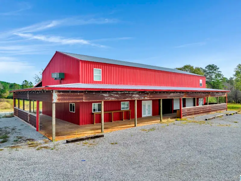 Prime Commercial Property Near Smith Lake with 3,800 Sq Ft Building and Billboard Income