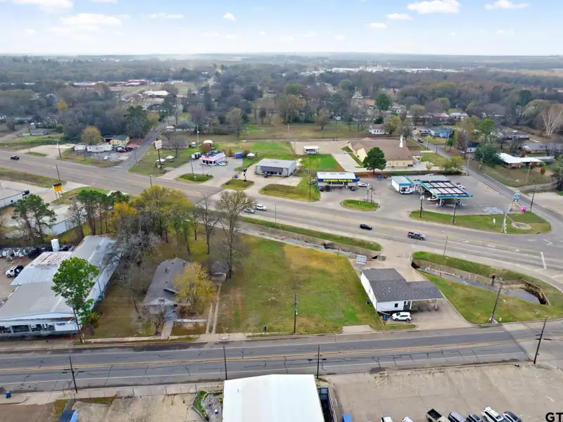 Prime Commercial Property with Building and Home on Half Acre Lot