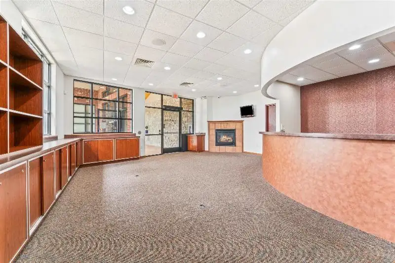 Versatile Commercial Condo for Sale Near Hwy 151 & 41 with Multiple Offices and Amenities