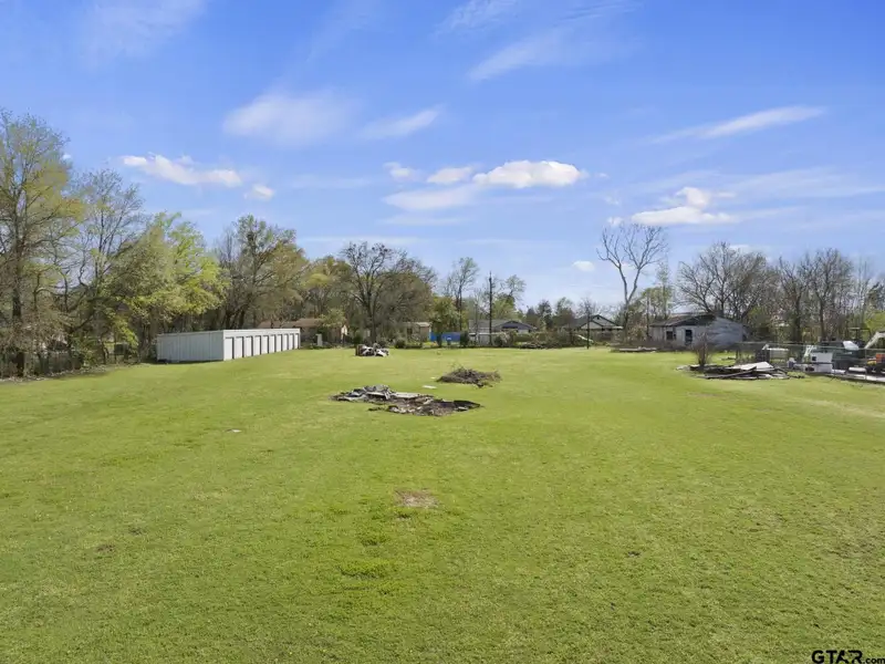 2-acre Commercial Property with Storage Units and Dual Road Frontage