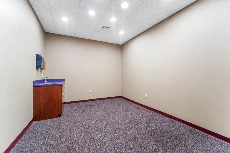Versatile Commercial Condo for Sale Near Hwy 151 & 41 with Multiple Offices and Amenities