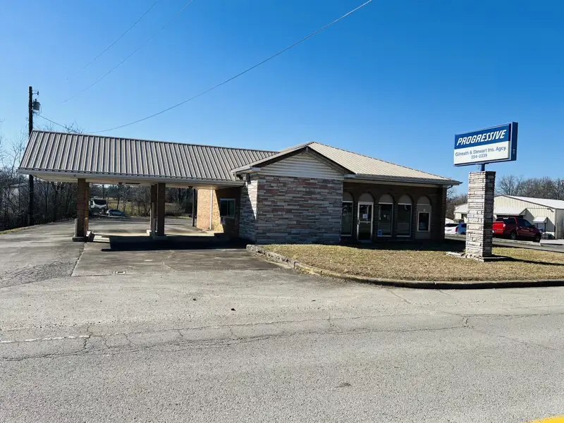 Historic Downtown Brick Building with Vault, Ideal for Office or Retail Conversion