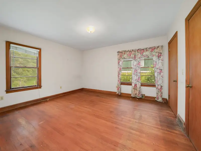 Prime 2.58-acre Multifunctional Property with Ranch Home and Outbuildings Near High-traffic Area