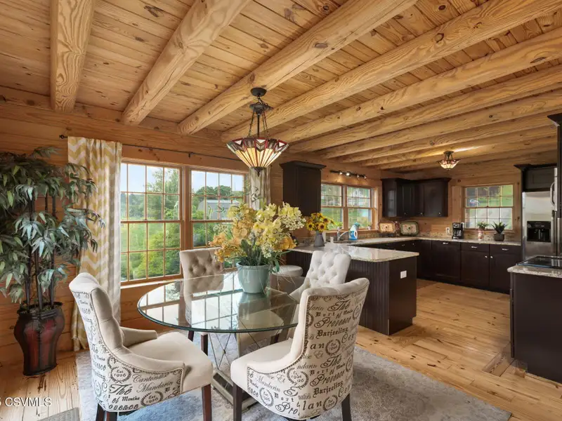Commercial Log Home on 2 Acres with 3 Bedrooms and Scenic Views