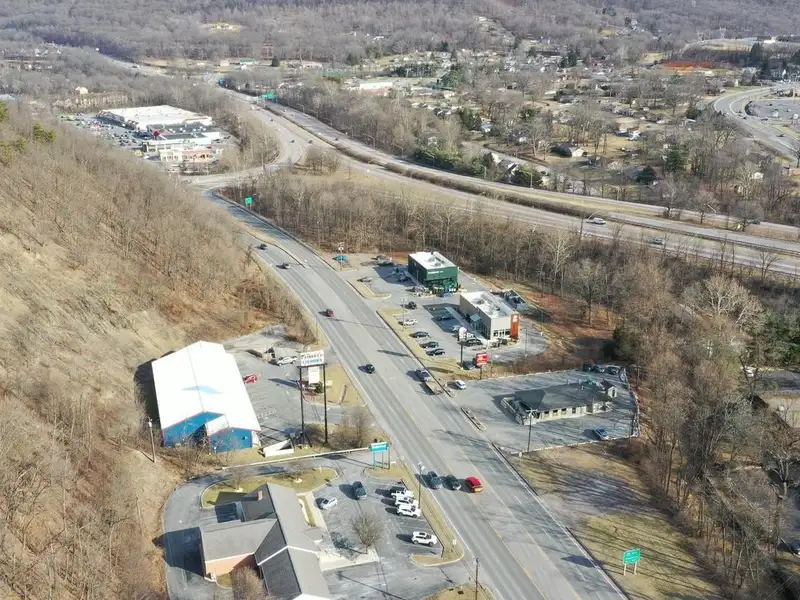 Versatile Commercial Property with Showroom, Offices, and Large Metal Building in Prime Location