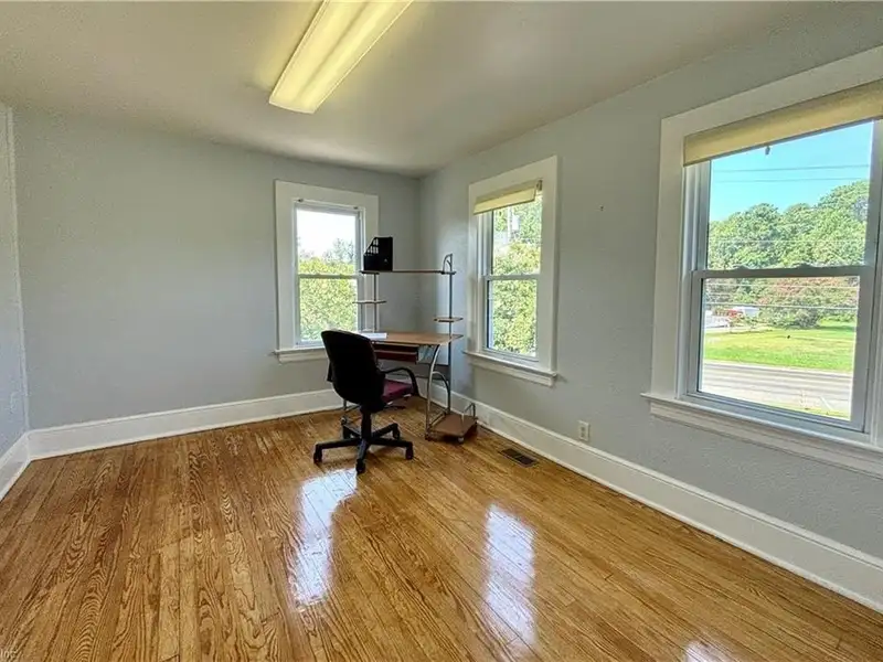 Commercial Victorian Building in White Stone with Multi-level Office and Event Spaces