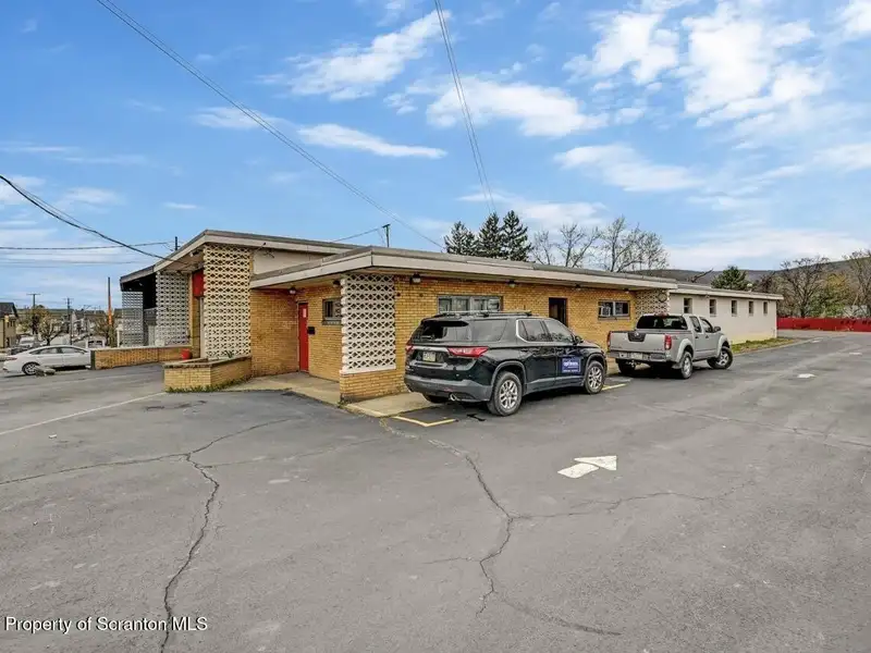 Mixed-use Building with Retail Space and Parking for Sale in Prime Location