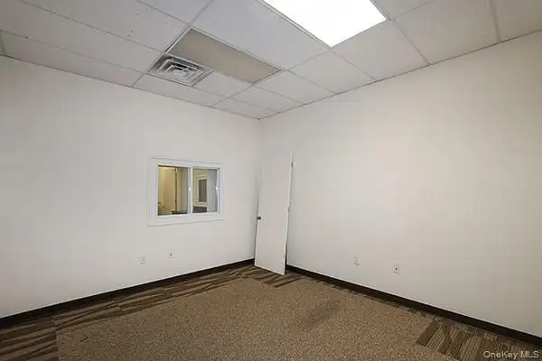 Well-maintained 7000 Sq Ft Retail/industrial Building with Multiple Suites on Merrick Road