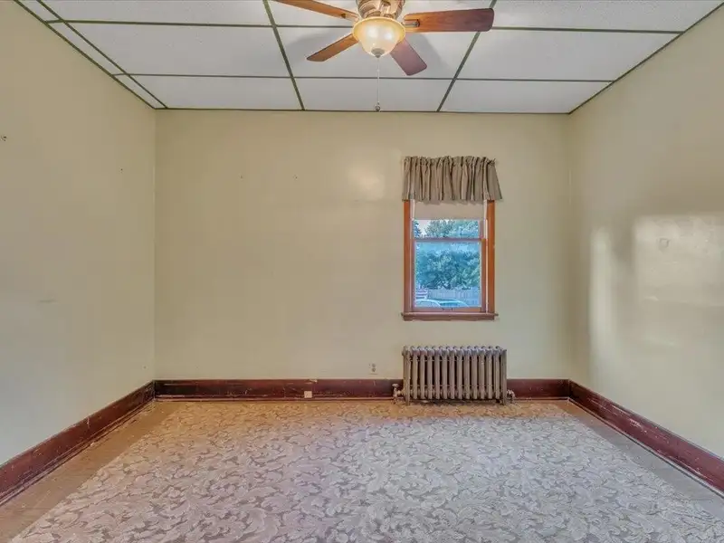 Versatile Corner Commercial Property with Retail Space and Two Apartments in Prime Location