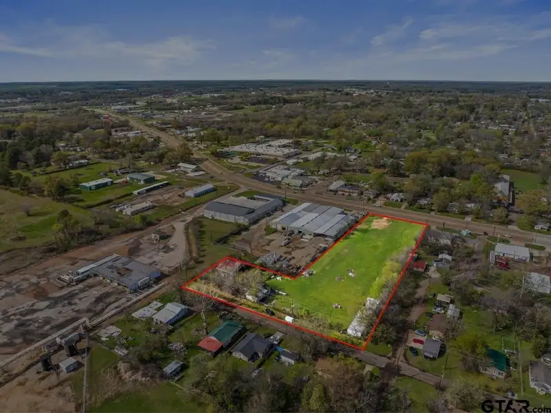 2-acre Commercial Property with Storage Units and Dual Road Frontage
