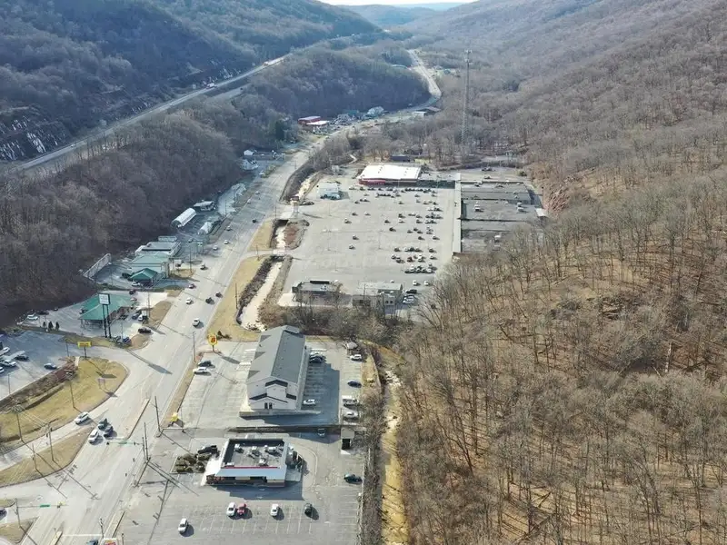 Versatile Commercial Property with Showroom, Offices, and Large Metal Building in Prime Location