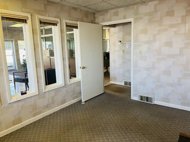 Historic Downtown Brick Building with Vault, Ideal for Office or Retail Conversion