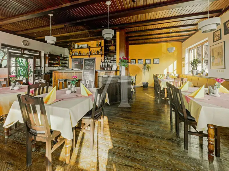 Versatile Residential and Commercial Building with Restaurant in Münchsmünster