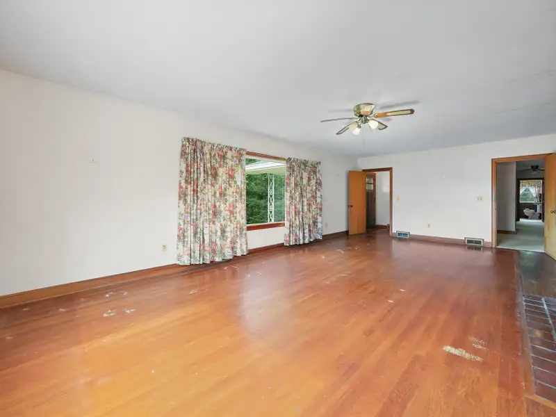Prime 2.58-acre Multifunctional Property with Ranch Home and Outbuildings Near High-traffic Area