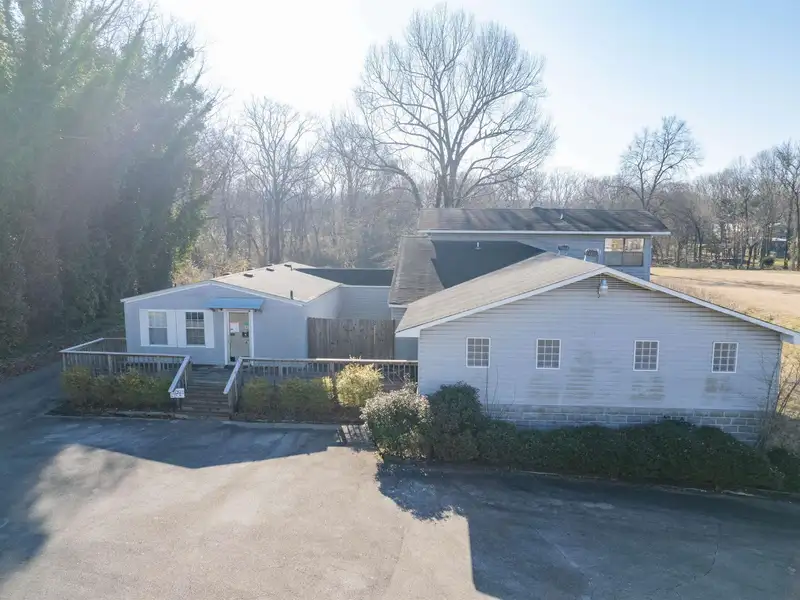 Commercial Property in Leeds - 2 Acres with Former Pet Clinic Facilities and Road Frontage