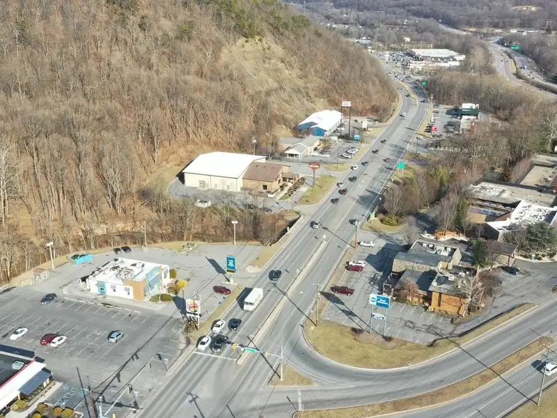 Versatile Commercial Property with Showroom, Offices, and Large Metal Building in Prime Location
