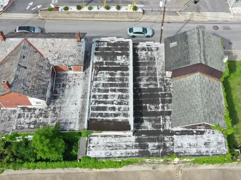 Large Commercial Building with Unique Floor Plan and Adjacent City-owned Lot for Sale