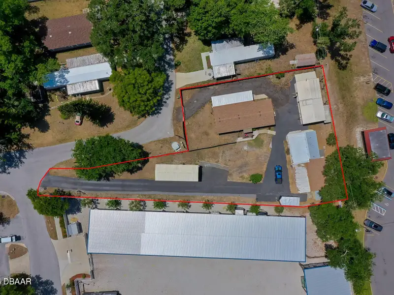 Mixed Use Property: Light Industrial Lot with Adjoining Residential Home and Expansion Potential