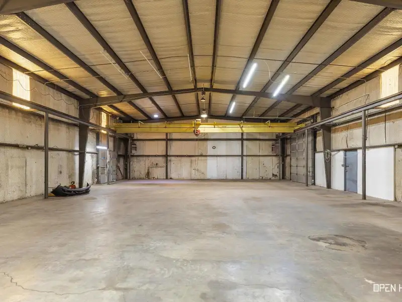 Insulated Warehouse and Office Space with Crane, Fenced Yard in Prime Location