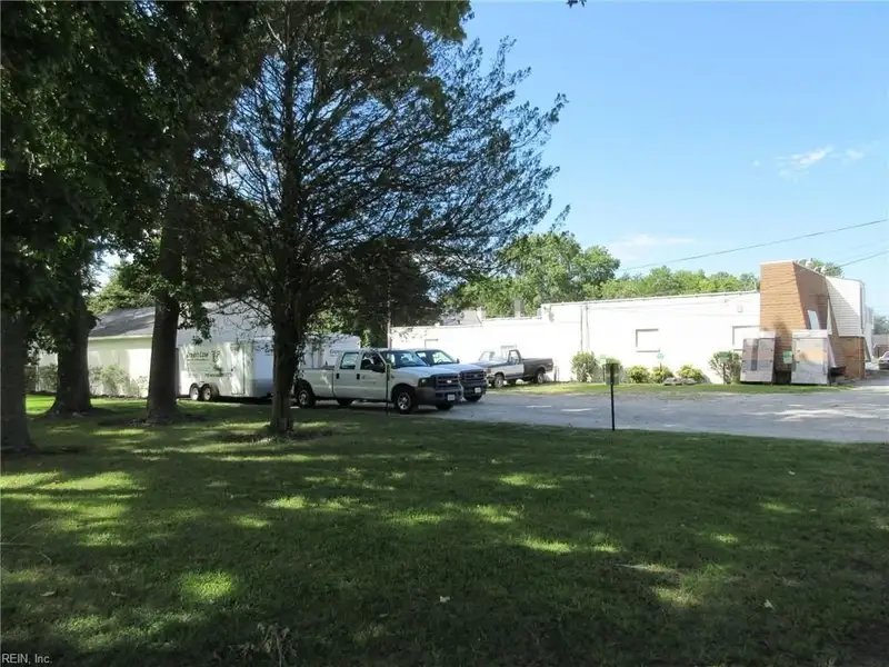 Turnkey Fully Leased Office Building with Garages in Prime Langley Afb Location