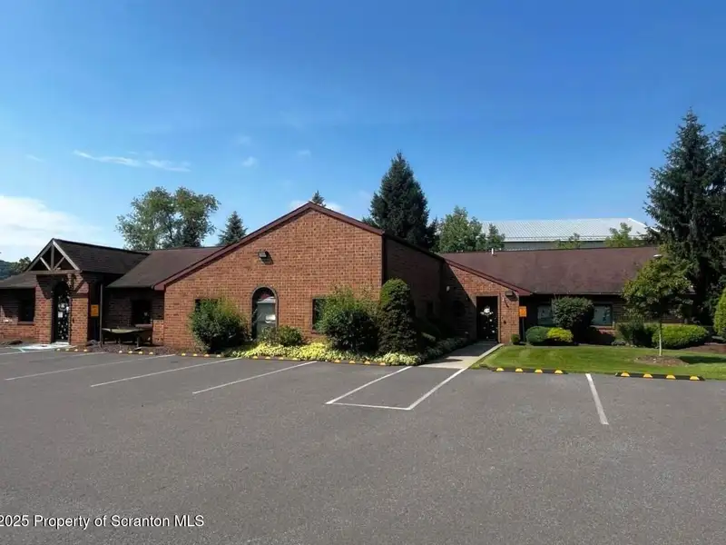 Versatile 4,800 Sq. Ft. Commercial Building with Parking and Outdoor Space in Prime Location