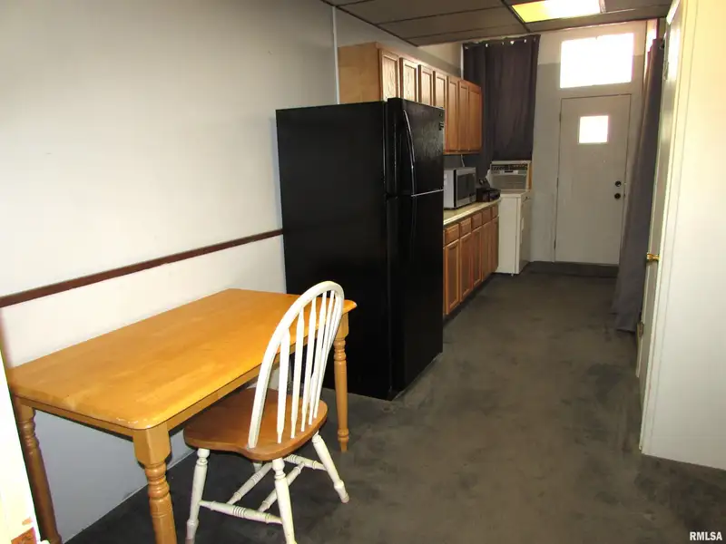 Versatile Commercial Property with Kitchen and Bath in Historic Metamora Square