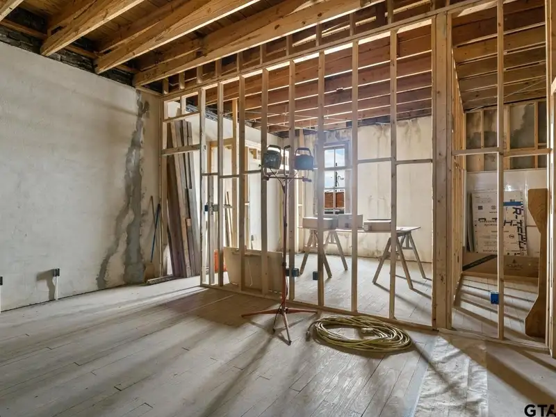 Unfinished Downtown Commercial Building with High Traffic Visibility and Mixed-use Potential