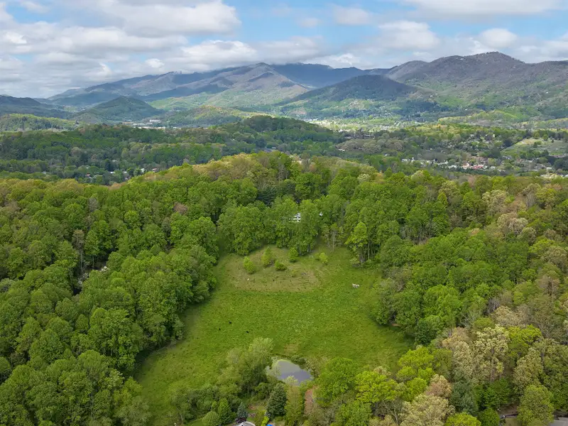 25+ Acre Pastoral Property with Pond and Mountain Views Near Downtown Waynesville
