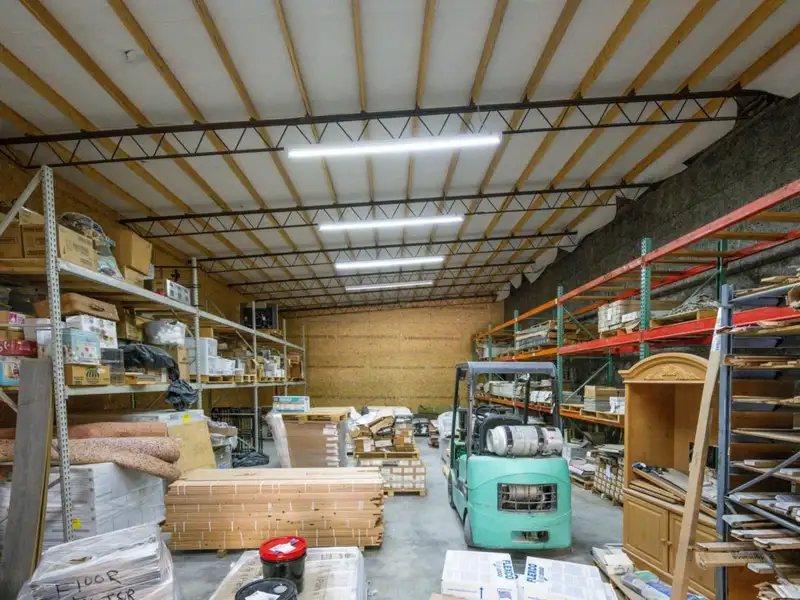 Large Commercial Building on Highway 412e in Parsons with Extensive Frontage and Warehouse Space