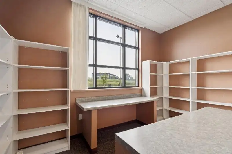 Versatile Commercial Condo for Sale Near Hwy 151 & 41 with Multiple Offices and Amenities