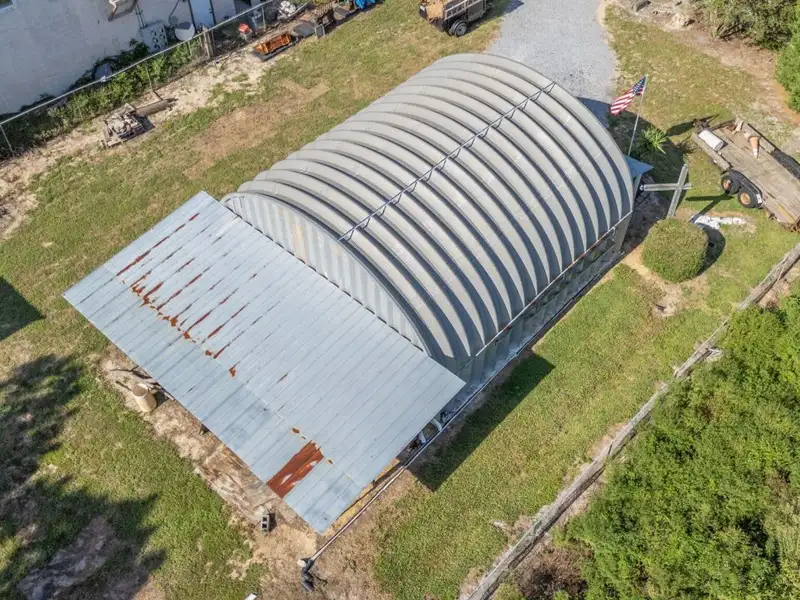 30x30 Enclosed Quonset Building with Pole Barn and Storage on Hwy 98