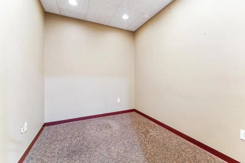 Versatile Commercial Condo for Sale Near Hwy 151 & 41 with Multiple Offices and Amenities