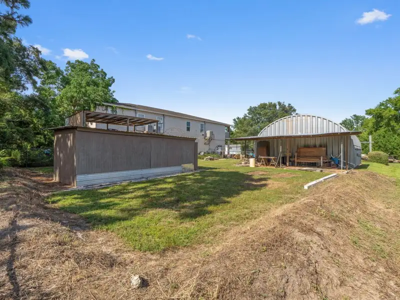 30x30 Enclosed Quonset Building with Pole Barn and Storage on Hwy 98