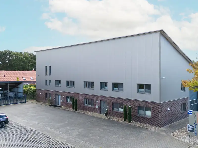 Modern Commercial Building with Exclusive Living Space in Aurich's Schirum Ii Industrial Estate
