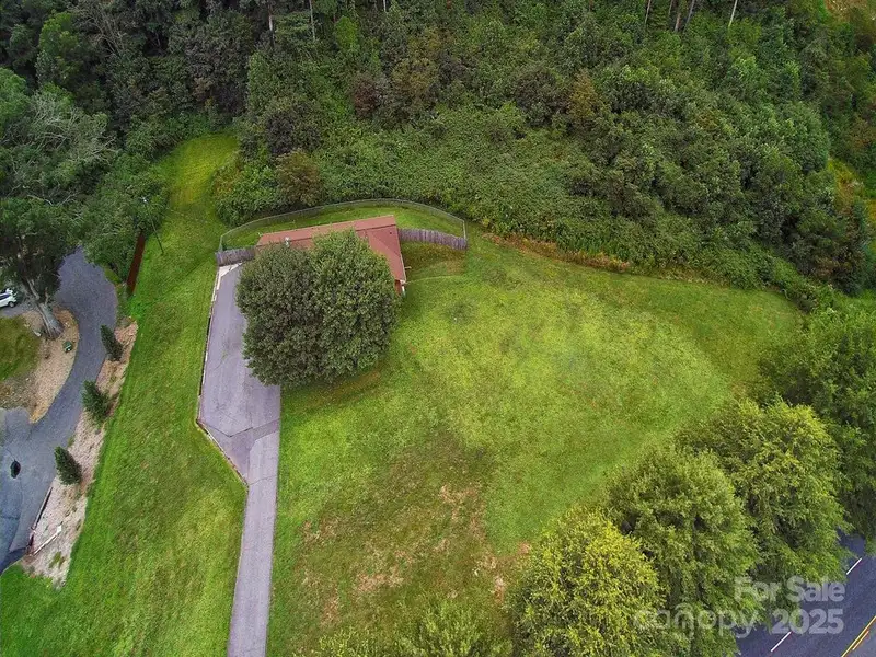 Prime 1.8 Acre Commercial Property with Home in Waynesville, Nc on Major Corridor