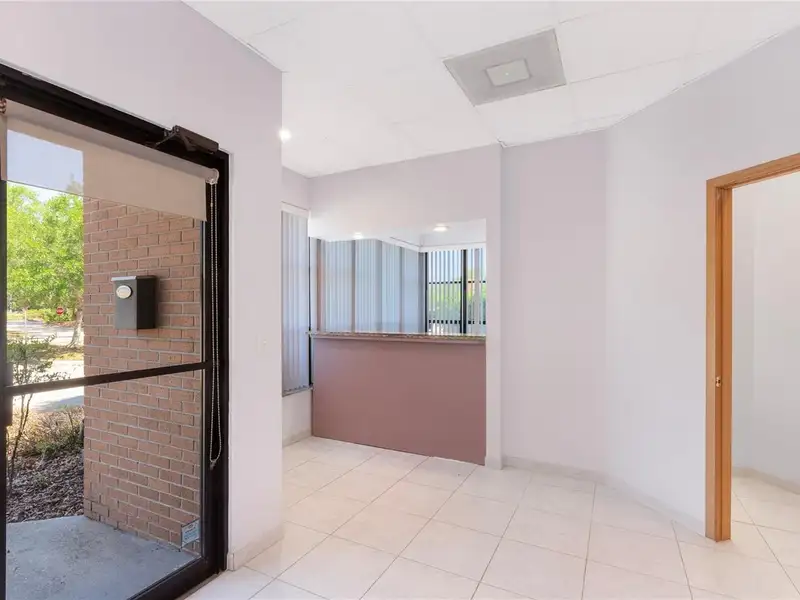 End Unit Tri-plex Commercial Space with Parking in Prime Location